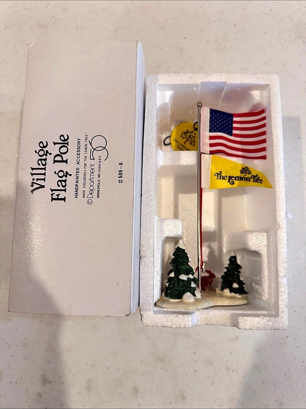Department 56 Village Flag Pole (The Lemon Tree) Holiday Ornament Set